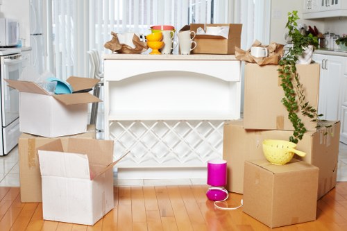 Furniture and boxes prepared for transport by removals van