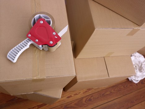 Loading furniture into a van near Harrow residential streets