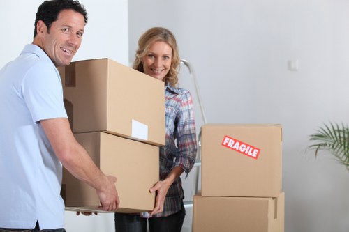 Careful handling of furniture during a home move in Harrow